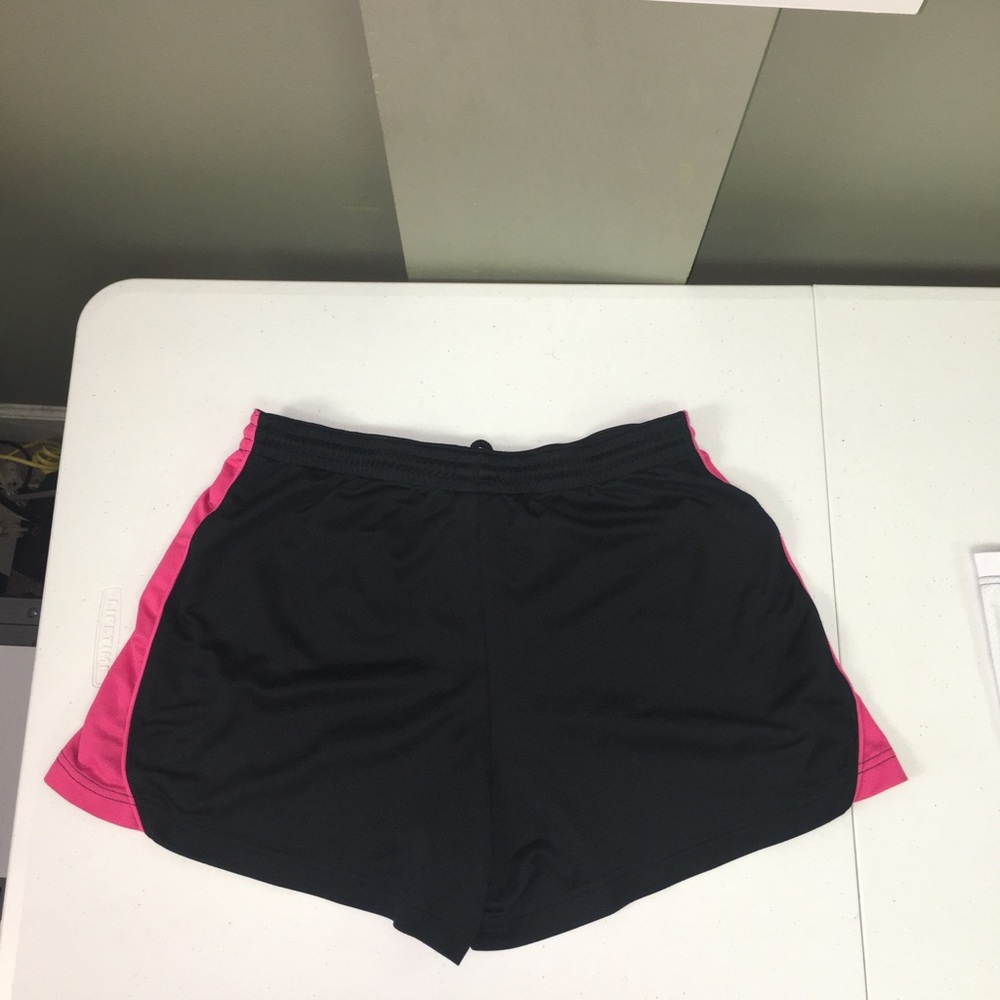 Black and pink size medium Nike running shorts